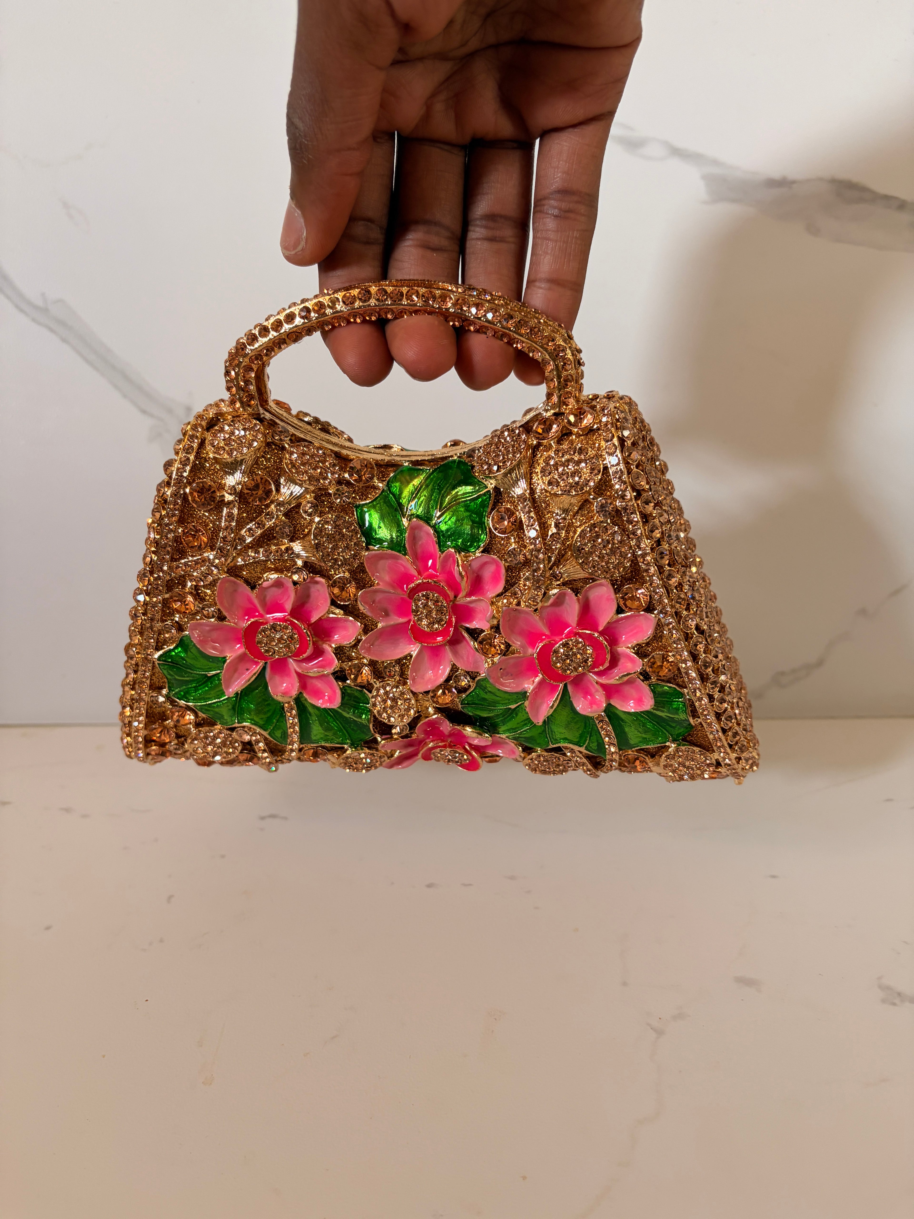 THE "CAMELLIA" CLUTCH
