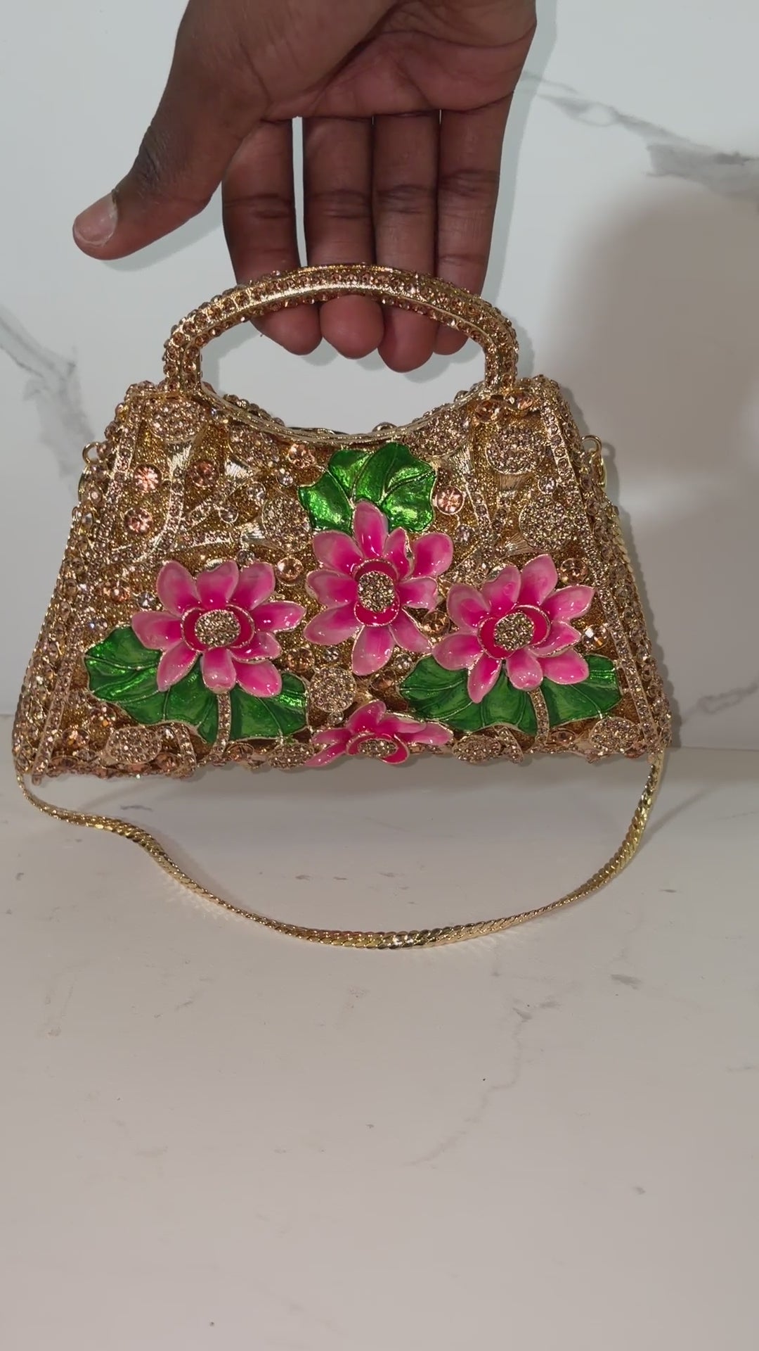 THE "CAMELLIA" CLUTCH